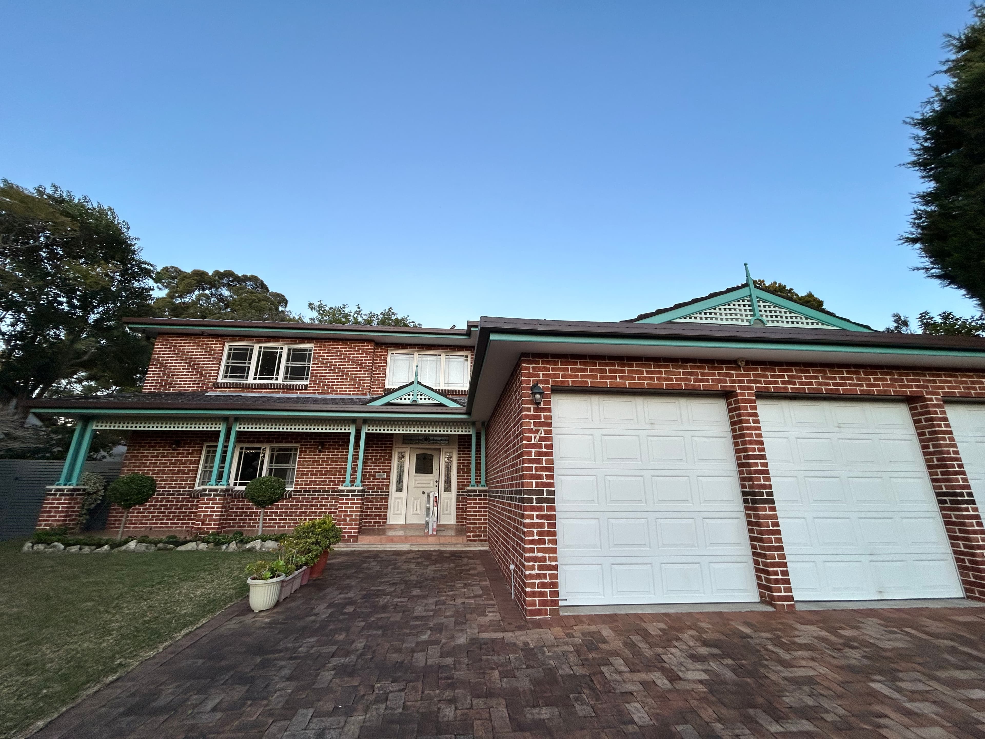Chatswood brick house exterior with refreshed trims and facade details after painting